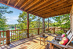 Terrace level covered deck at 128 Stonehouse Road in The Preserve at Stoney Ridge, Dadeville, AL. Professional photos and tour by I Shoot Houses at Go2REasssistant.com