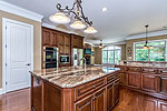 Another view of the kitchen at 156 Walnut Point Drive in Emerald Mountain, Wetumpka, AL. Professional photos and tour by Go2REasssistant.com