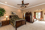 Master suite with sitting room overlooking the lake at 1931 Lake Beauvoir Drive in Beauvoir, Montgomery, AL. Professional photos and tour by Go2REasssistant.com
