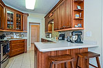 Kitchen at 249 Plantation Crossing in Glynwood, Millbrook, AL. Professional photos and tour by Go2REasssistant.com