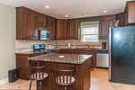 Bright, open kitchen at 26 Boulder Court in Stone Park, Pike Road, AL. Professional photos and tour by Go2REasssistant.com