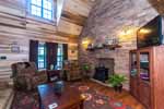 Greatroom with stone fireplace wall at 333 Lake Point Drive in Jacksons Gap, Lake Martin waterfront homes for sale. Photos by Go2REassistant.com