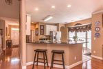 Kitchen with breakfast bar at 341 Green Chase Circle in Towne Lakes, Montgomery, AL. Professional photos and tour by Go2REasssistant.com