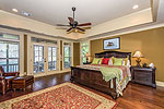 Main level Master Suite with a view at 421 Windy Wood, Windermere West, Lake Martin, Alexander City, AL. Professional photography and tour by Sherry Watkins, Go2REassistant.com