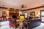 Family room with fireplace at 6202 Henley Way in Henley Hedge, Montgomery, AL. Professional photos and tour by Go2REasssistant.com