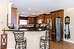 Open kitchen with granite and stainless appliances at 675 Bon Terre Blvd. in Bon Terre, Pike Road, AL. I Shoot Houses...photos and tour by Go2REasssistant.com