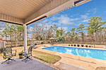 Huge salt water pool on wooded 1+acre lot at 90 Walnut Point in Emerald Mountain, Wetumpka, AL. Professional photos and tour by Go2REasssistant.com